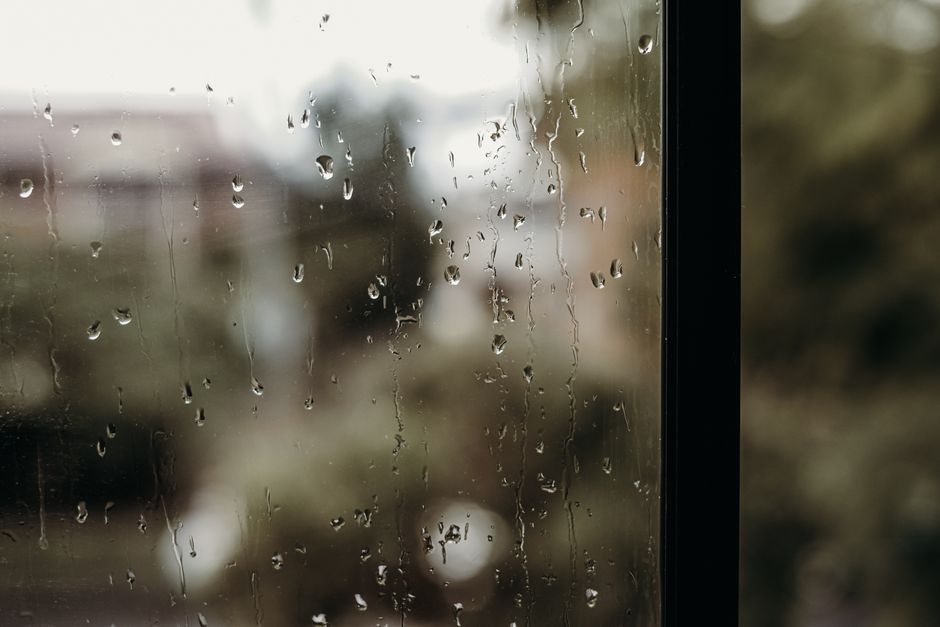 Close up of energy efficient windows protecting a home from rain