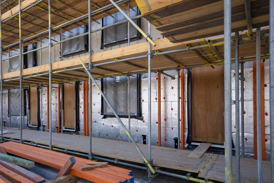 Professional contractor performing expert window installation